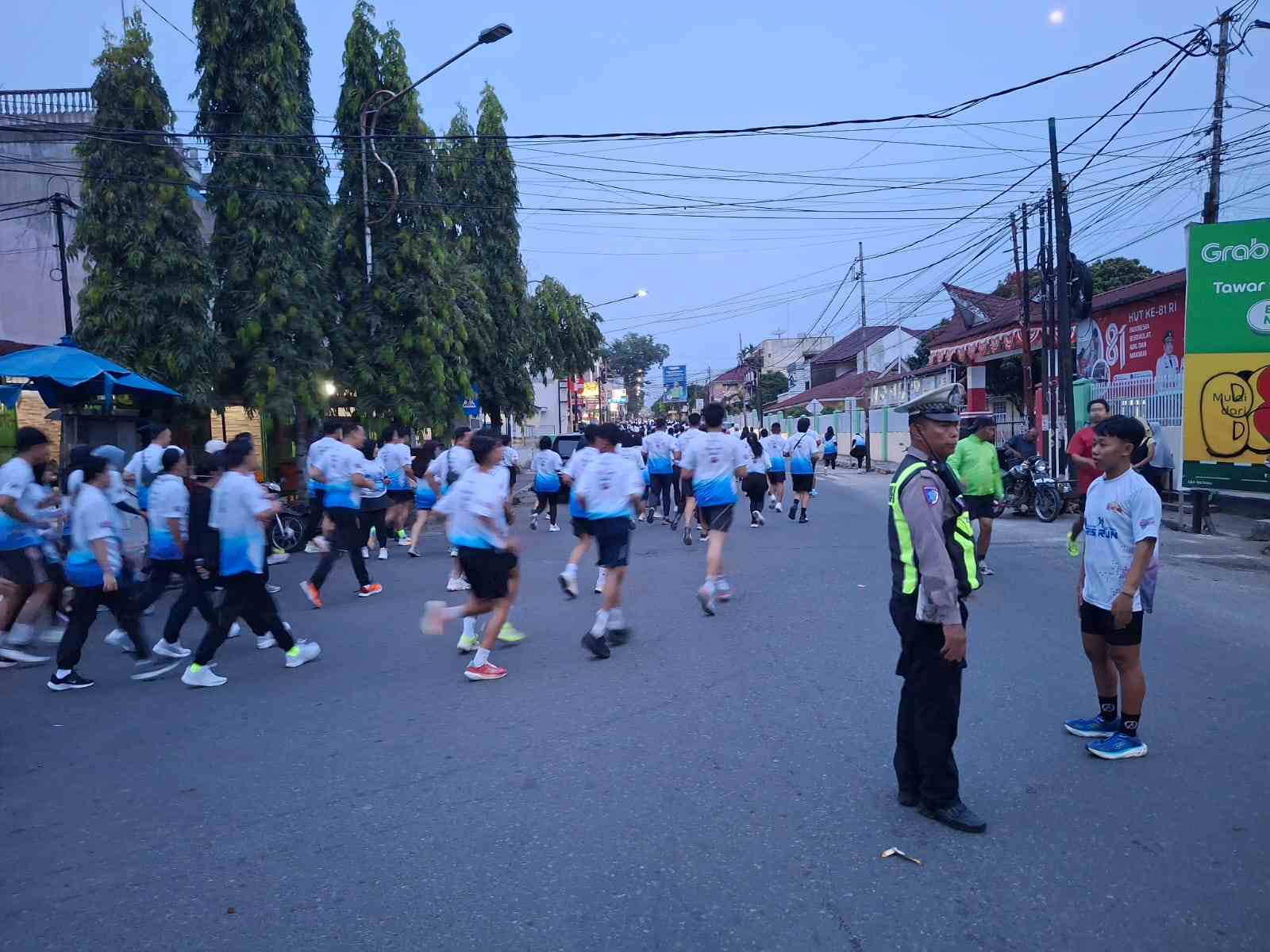 Sat Lantas Pematangsiantar Amankan Car Free Day Marpesta QRIS Bank Indonesia di Lapangan H. Adam Malik, Kegiatan Berjalan Aman & Baik